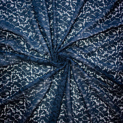 Navy blue lace fabric with a floral pattern