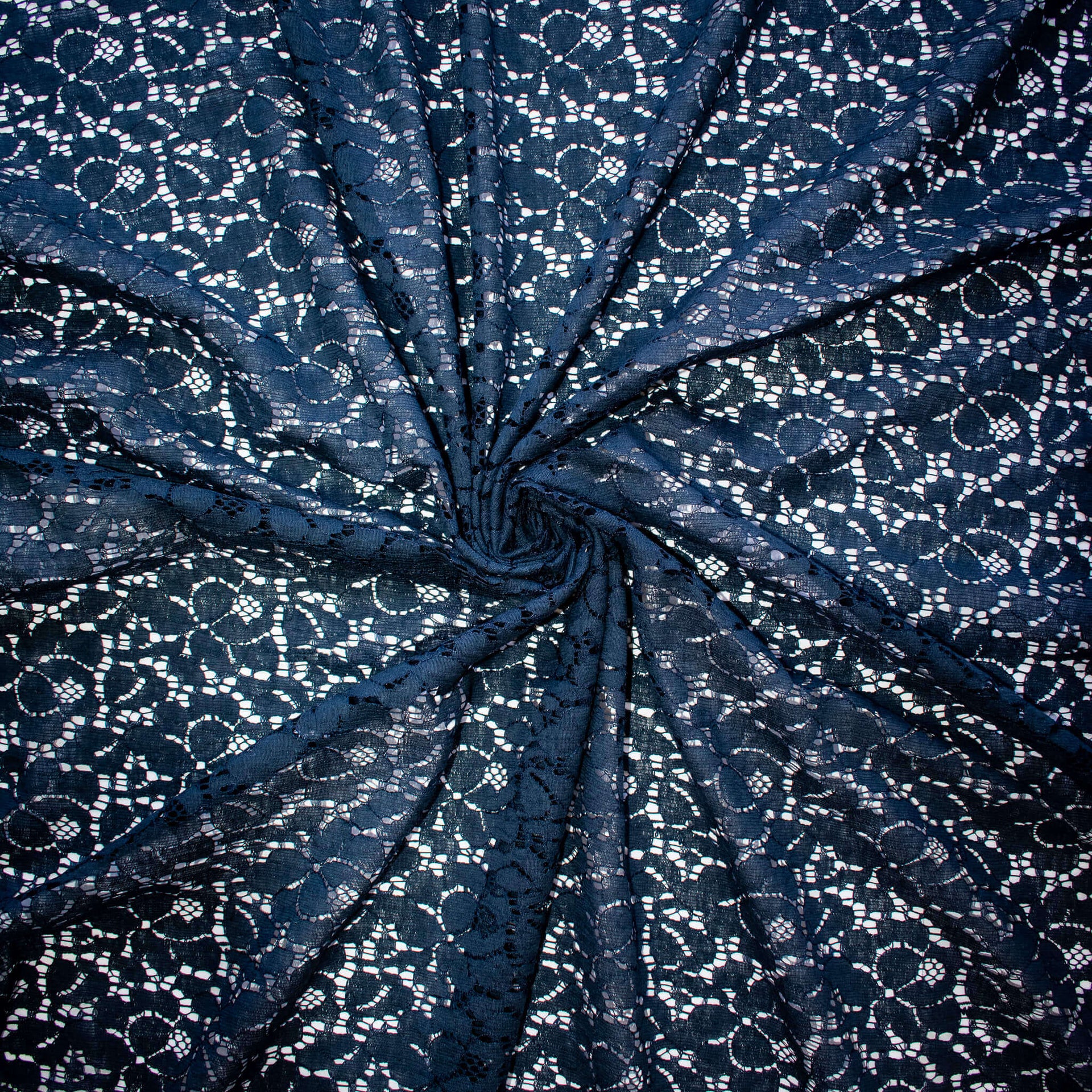 Navy blue lace fabric with a floral pattern