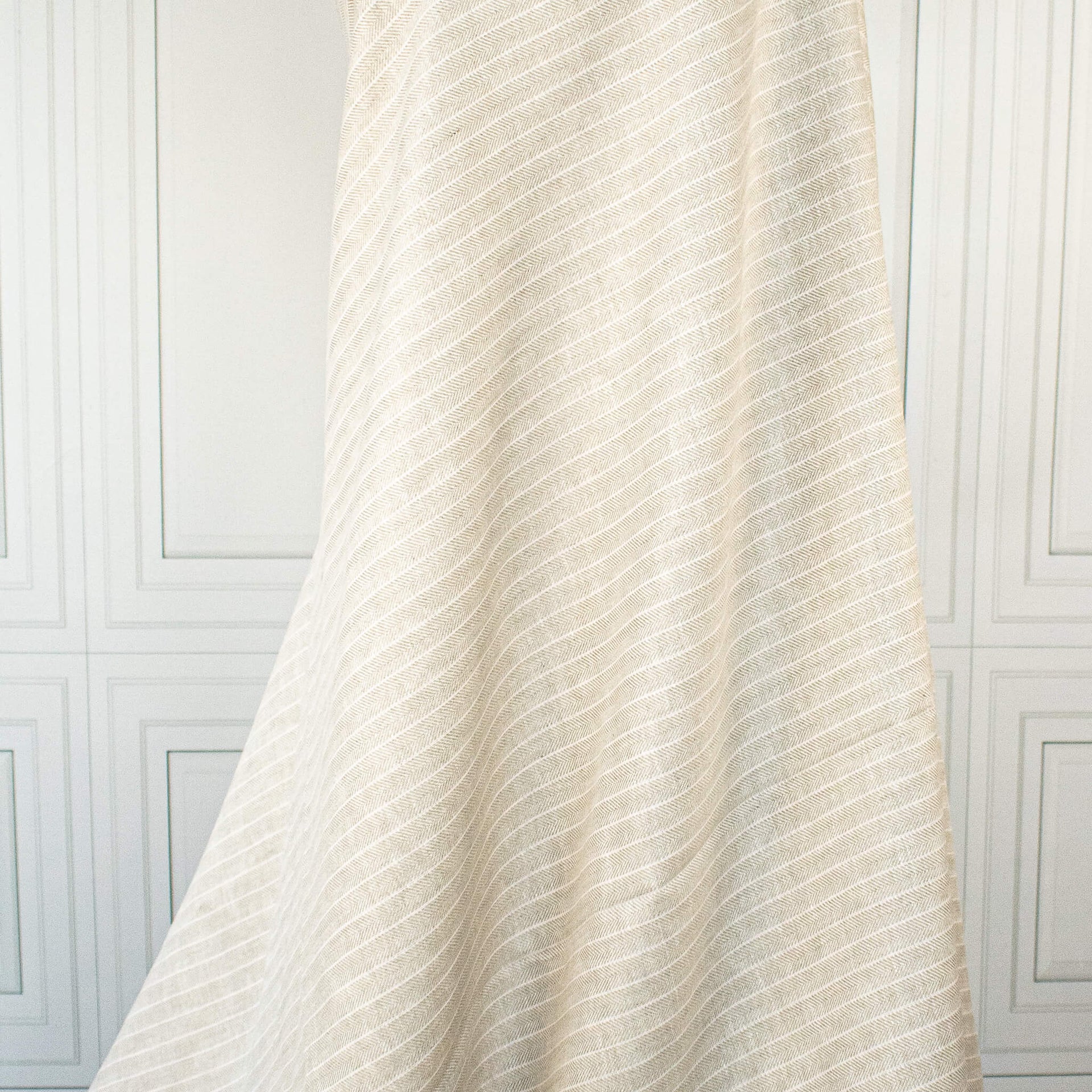 European Mid-Weight 100% Linen Stripe Herringbone Weave fabric draped on dressform.