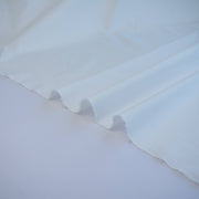 Close-up of a white NYC designer shirting fabric 