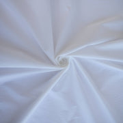 Close-up of white NYC designer shirting fabric 