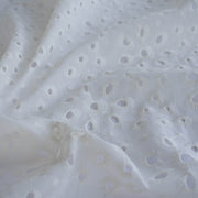 Image of  Italian Cotton San Gallo Lace in soft white, a delicate broderie anglaise fabric by the yard. 