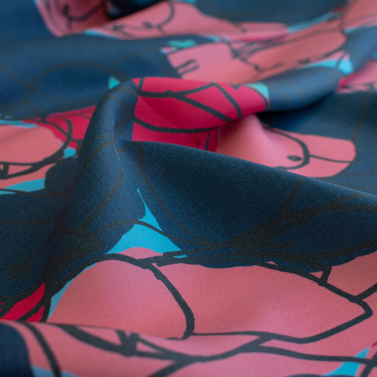 Close up image of  Italian silk twill fabric by the yard in a modern painterly print 