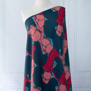 Image of  Italian silk twill fabric by the yard in a modern painterly print  draped on dress form.