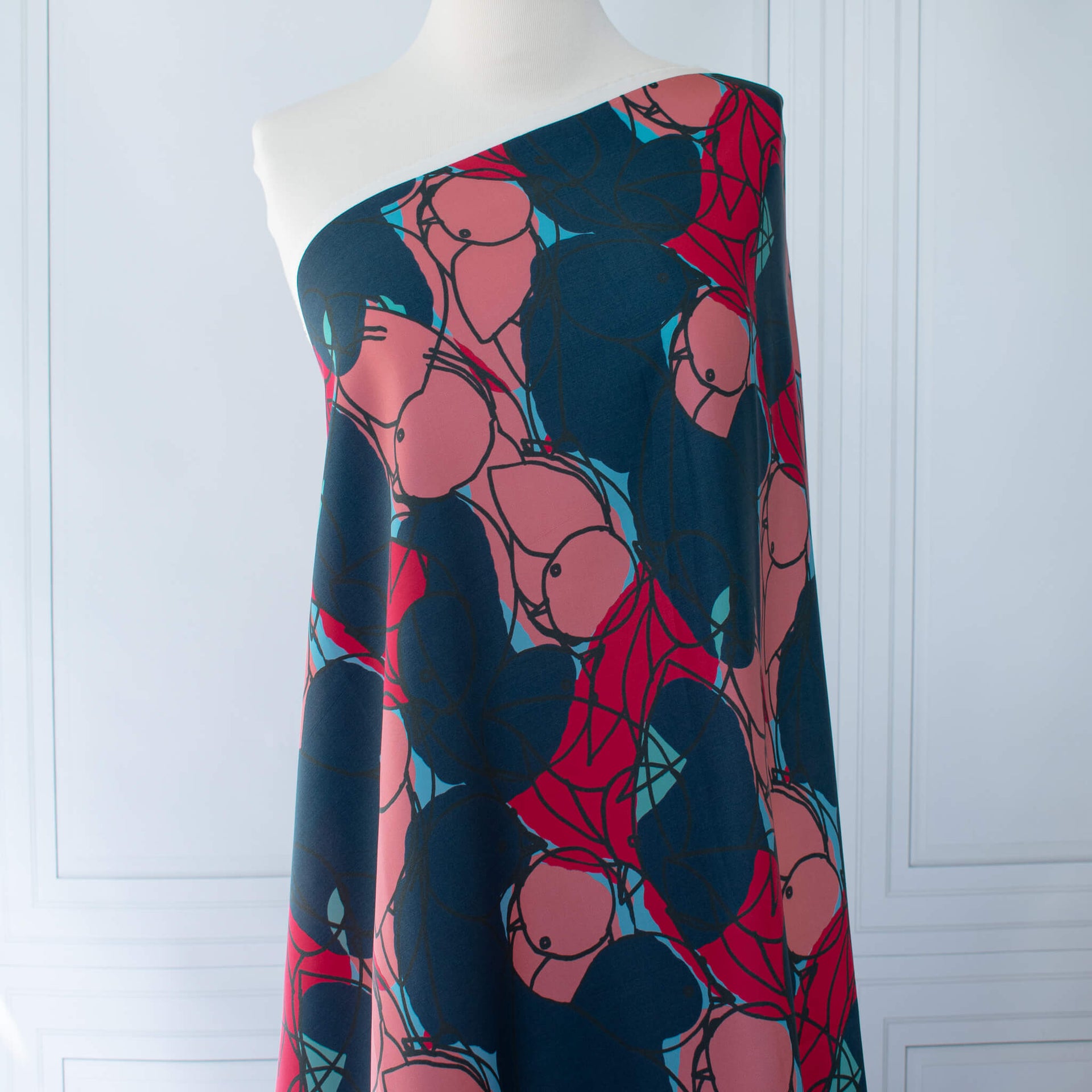 Image of  Italian silk twill fabric by the yard in a modern painterly print  draped on dress form.