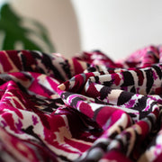 Modern and fabulous, that's how you'll look in this abstract DTY print.  Perfect for a wrap dress or top that is pure sophistication!  DTY is a double twisted yard which is not as thin as an ITY knit.  It has a soft touch, drapes nicely, and is easy to sew.  Close up image