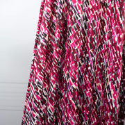 Modern and fabulous, that's how you'll look in this abstract DTY print.  Perfect for a wrap dress or top that is pure sophistication!  DTY is a double twisted yard which is not as thin as an ITY knit.  It has a soft touch, drapes nicely, and is easy to sew. Image of fabric drape.