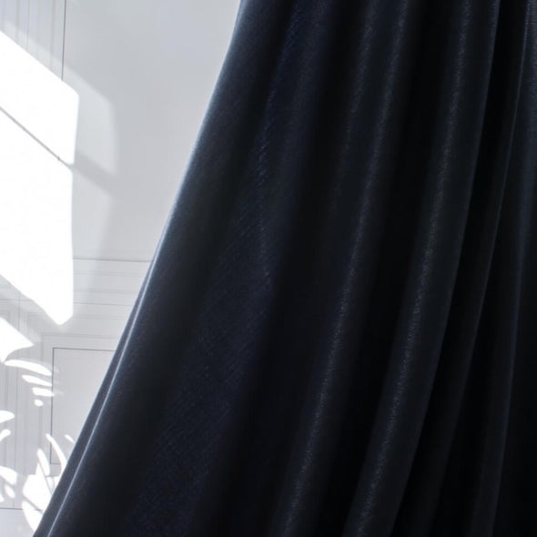 Image of fabric drape. A gorgeous wool blend suiting from a Beverly Hills couture house is sure to add glamour to your outfit!  A soft textured hand with a herringbone stripe pattern that shimmers with silvery metallic threads. A perfect choice for a jacket, skirt, wide leg pant, or perhaps a coat dress. 