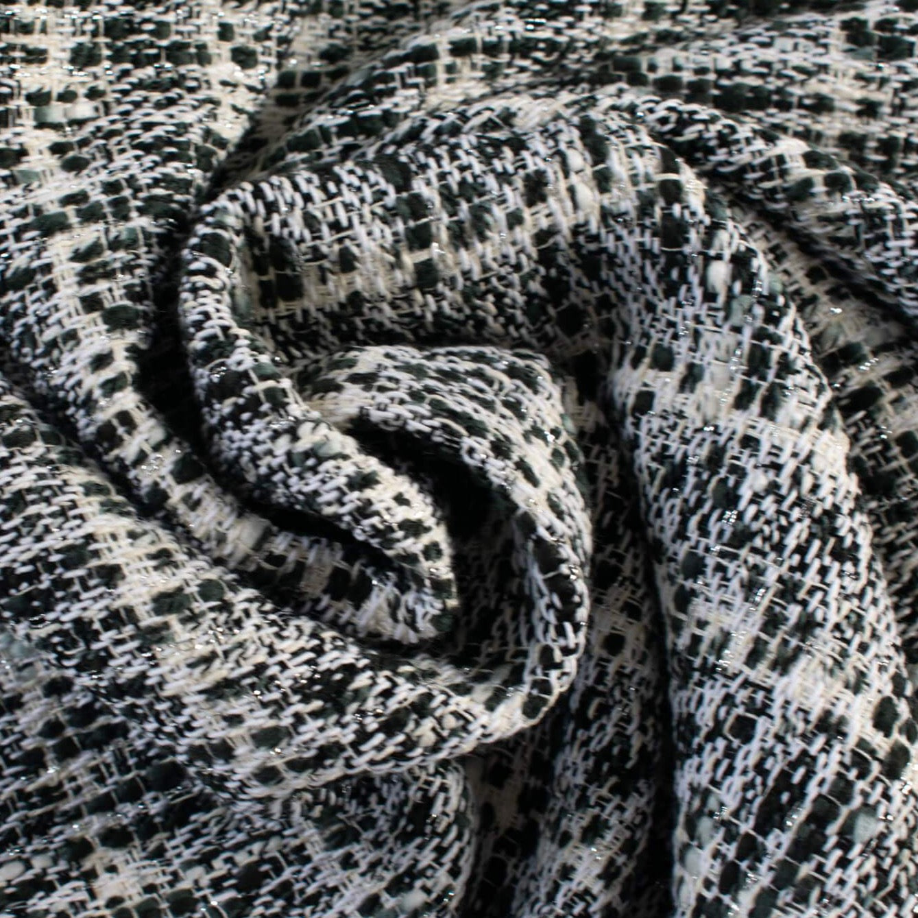 Black and white metallic jacquard fabric imported from France. Wool Blend, fabric by the yard. Image depicts fabric body.