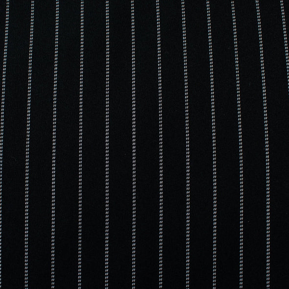 Gorgeous Couture Designer 4-Ply Silk Black with a white vertical double pinstripe, this premium medium weight silk has a soft sheen and gentle drape. A fine smooth hand feels buttery on the skin, perfect for a wide leg pant, vest, jacket or dress! Image of fabric pattern.