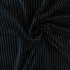 Gorgeous Couture Designer 4-Ply Silk Black with a white vertical double pinstripe, this premium medium weight silk has a soft sheen and gentle drape. A fine smooth hand feels buttery on the skin, perfect for a wide leg pant, vest, jacket or dress! Image of fabric body.