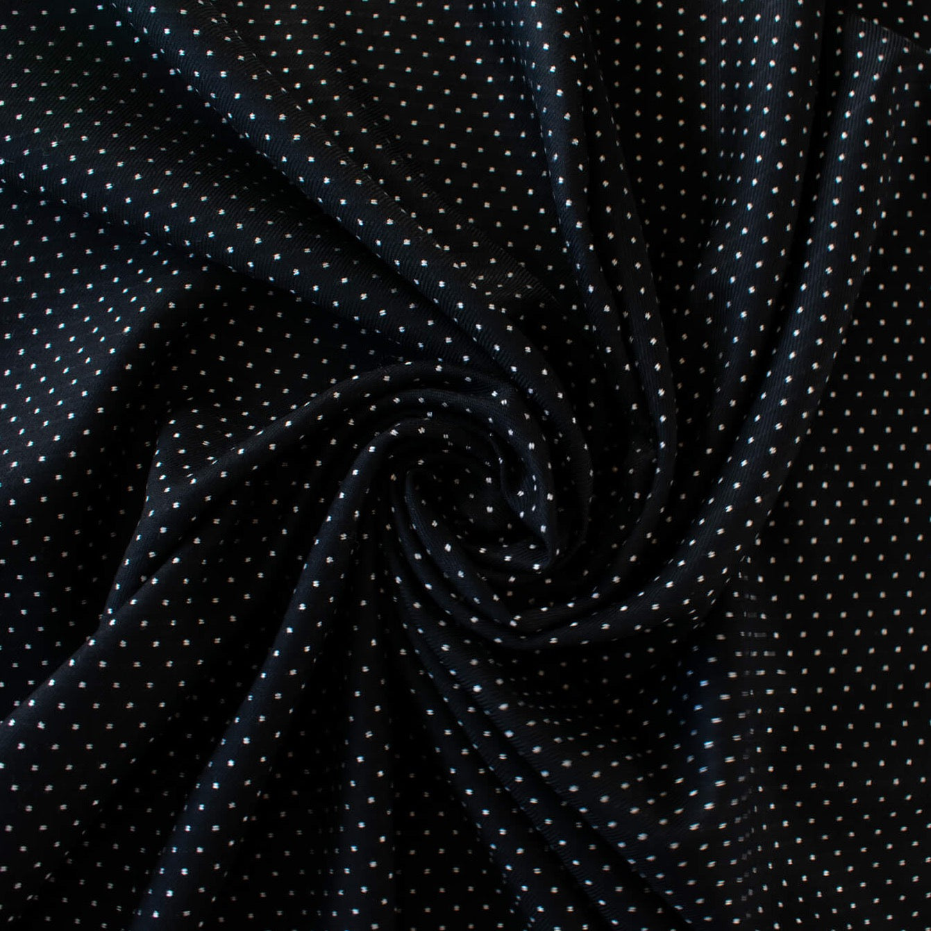 Luxurious designer suiting in black with a white and gold metallic running stitch. Take sophistication up a notch in this gorgeous wool blend with a soft and supple hand. Perfect for a glamorous tailored suit or jacket. Image of fabric fullness