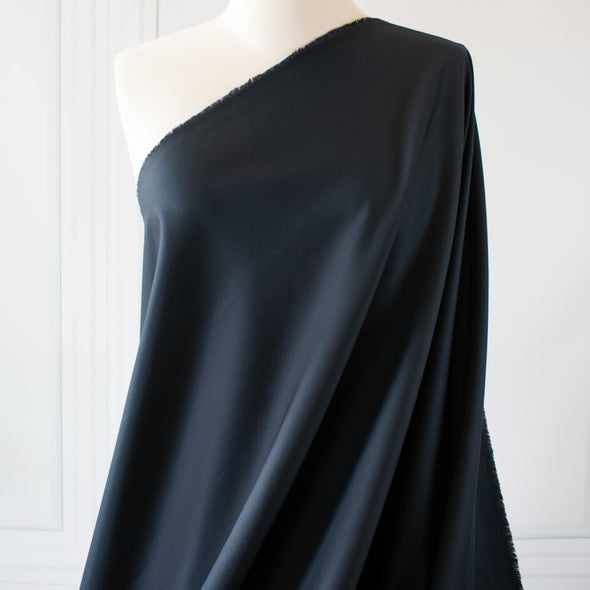 Curated from a LA design house which specializes in luxurious minimalist fashion, this cotton suiting will have you feeling sophisticated and confident.  Create your own little black dress for Spring and Summer! Image on dressform