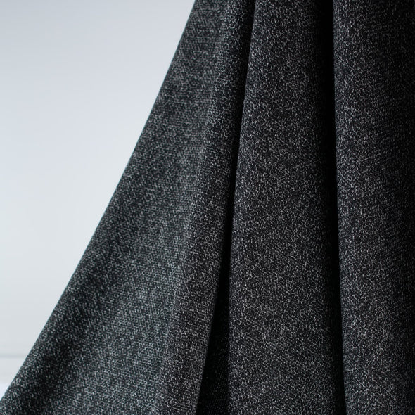 This soft designer suiting from Italy will sew up a jacket, skirt, or wide leg pant beautifully. It would also make up a chic hoodie for those days you want comfort and style! Photo shows fabric lengthwise drape.