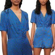 Designer Blue paisley Italian satin challis with a fluid drape and satiny softness from the Parisian luxury designer M@je. Image of model romper.