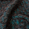 High End Designer Label Brocade Boucle in a stunning Cyan Blue, Black and Charcoal  A textured fabric with a soft hand. The metallic threads create a stunning statement piece!   Close up image.