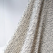 This NYC designer boucle just made my dreams come true! A soft boucle of looping curls imported from Italy will have you imaging you stepped off the runway! Ideal for the French Jacket you're just itching to make! Photo of fabric drape.