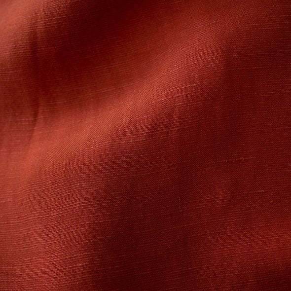 Richly saturated in color, this linen blend has a soft, textured hand and the familiar drape of rayon. Make up a gorgeous top, dress or skirt that stands out!  Translucent with a pleasing slubbed texture, may need lining for dresses and skirts. Close up image of fabric texture.