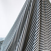 Capture your inner French style with this incredibly soft closely knitted horizontal stripe Ponte from a NYC designer. Imported from Italy, this is such a pleasure to sew especially if you are just starting out with knits! With it's generous width, sew up your favorite top, skirt, dress or cardigan. Photo demonstrating fabric drape.