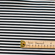 Capture your inner French style with this incredibly soft closely knitted horizontal stripe Ponte from a NYC designer. Imported from Italy, this is such a pleasure to sew especially if you are just starting out with knits! With it's generous width, sew up your favorite top, skirt, dress or cardigan. Photo with ruler demonstrating fabric design scale.  