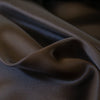 Indulge yourself in the luster of 100% Silk Charmeuse from a NYC Designer. A popular fabric for creating fluid bias cut garments and luxurious lining to your special pieces like the French Jacket. Close up photo.  