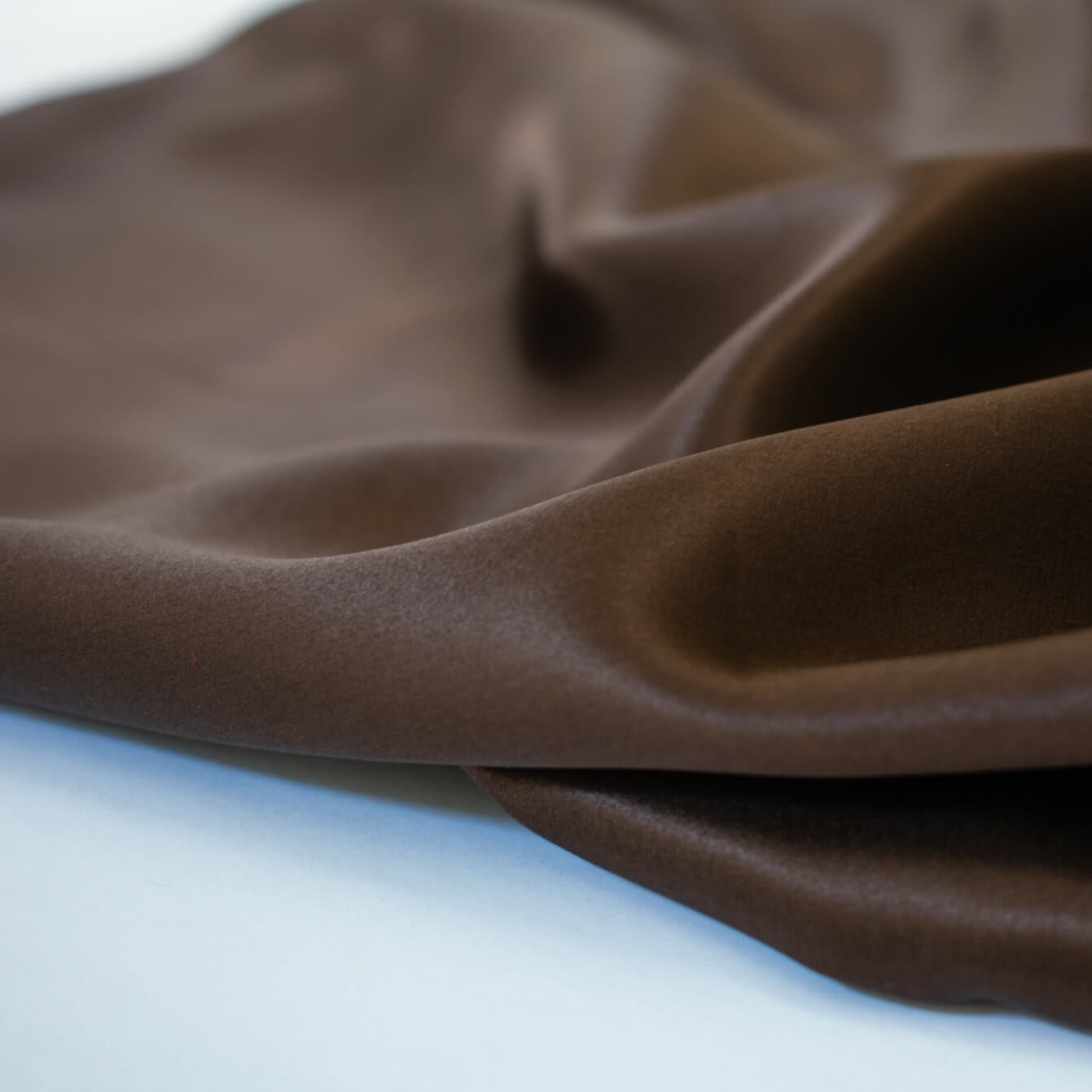 Indulge yourself in the luster of 100% Silk Charmeuse from a NYC Designer. A popular fabric for creating fluid bias cut garments and luxurious lining to your special pieces like the French Jacket. Photo demonstrating fabric luster and fluidity.