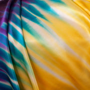 Los Angeles Designer 100% Silk Charmeuse in a modern and fun Tie Dye print! Have fun turning your creation into a sophisticated kaleidescope of color! Photo shows color on fabrics right side.