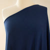 Designer blue modal cotton spandex knit Modal is smoother and softer than rayon viscose and is durable, breathable and shrink resistant. Best of all you'll love how it feels when you wear it! This would make up a lovely wrap top, cami or favorite T-shirt.  Close up image of fabric on dressform
