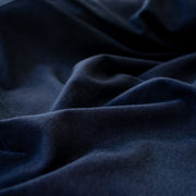 Designer blue modal cotton spandex knit Modal is smoother and softer than rayon viscose and is durable, breathable and shrink resistant. Best of all you'll love how it feels when you wear it!  This would make up a lovely wrap top, cami or favorite T-shirt. Close up image.