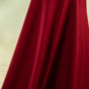 High-end designer Ponte knit in a gorgeous dark red. Create a stylish pencil skirt or make a bold statement in a red dress, either way you'll look fabulous! You'll love the soft touch of the fabric and the comfort of it's stretch. Image of fabric drape.