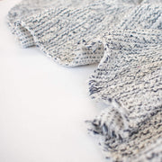 Cuddle up with a super soft textured boucle like sweater knit. Cream with flecks of gray and black are a perfect Spring and Summer choice for a cardigan or top.  Can't help but envision this with a bit of leather...tres chic!