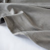 Faux Suede Jersey Knit - Modern, edgy and comfortable this fabric is perfect for a wrap dress of top. Image of selvedge.
