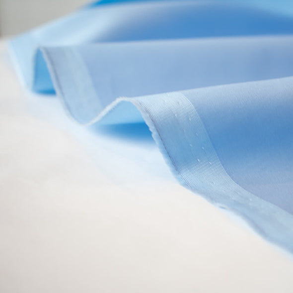 If the sheen on this light blue Halston cotton sateen gets your attention wait until you see how silky it feels!  Sew up a dress or a top and just try not to hug yourself, it's that lovely. 