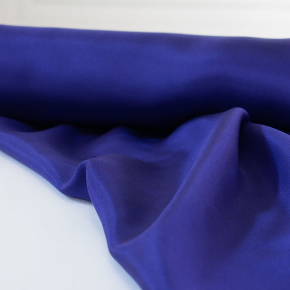 Wonderfully soft and silky this 100% China Silk is luxurious. Very lightweight and translucent.  Perfect for linings, tops and creating a soft trim on a classic French Jacket. Image of edge.