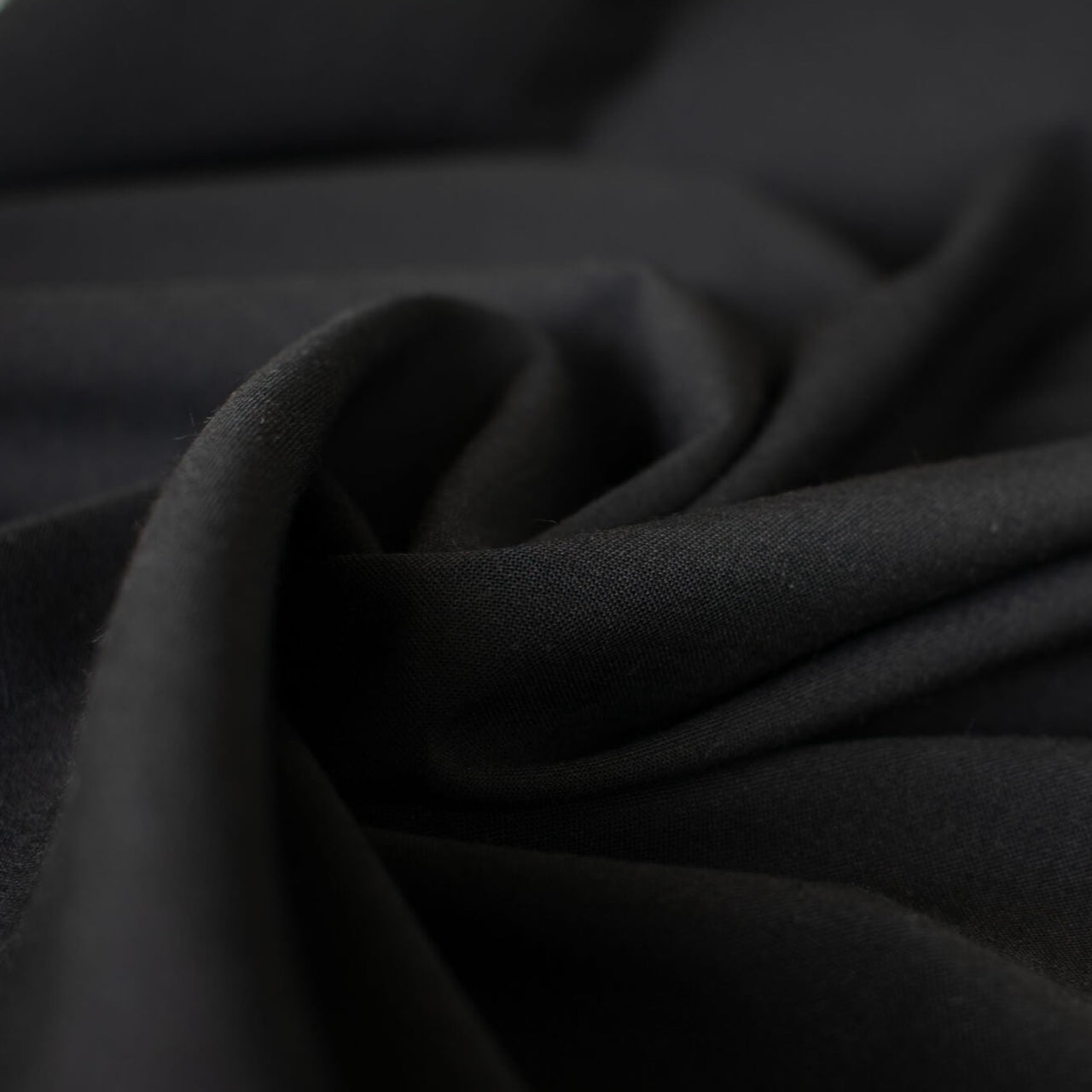 talian lightweight worsted wool suiting is just stunning.  This fabric is gorgeous and will be a true wardrobe builder.  It has the wear and strength of a woolen and a bit of stretch for comfort. Sew up a classic fitted sheath dress or maybe even a jacket. You can't go wrong with a fabric that is multi-seasonal.