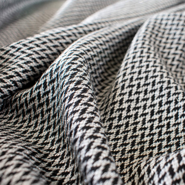 Italian Herringbone Sweater Knit with Metallic Threads -Wide. Close up image.