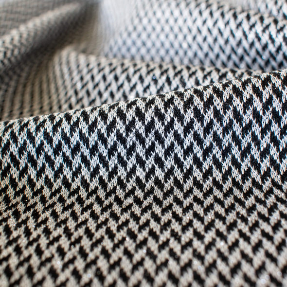 Italian Herringbone Sweater Knit with Fine Metallic Threads -Wide. Close up image.