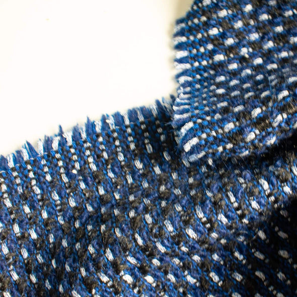 This is a lovely wool boucle imported from Italy. Dress it up or down you will love the softness. Ideal for you French Jacket with a fantastic selvedge! Photo 2 of selvedge edge.