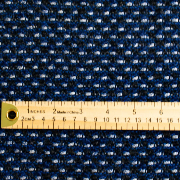 This is a lovely wool boucle imported from Italy. Dress it up or down you will love the softness. Ideal for you French Jacket with a fantastic selvedge! Photo with ruler for scale.