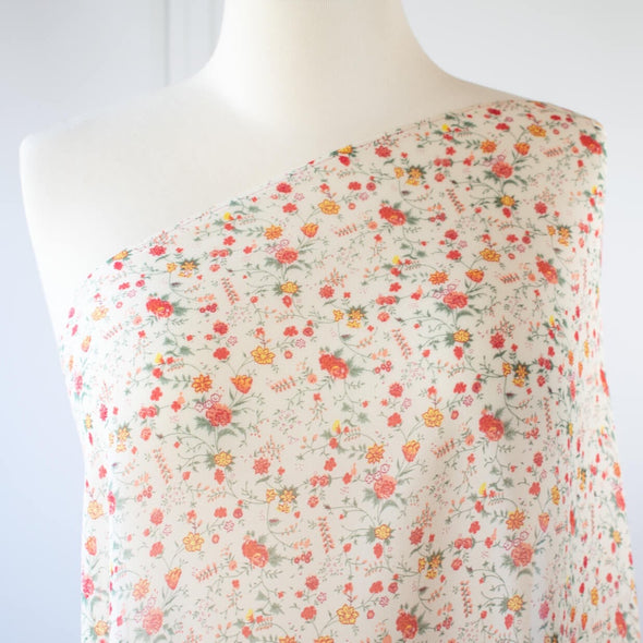 Feminine and sophisticated floral georgette from a LA based ethical fashion brand that supports responsible production.  Delicate red rose floral print is so lovely, it's sure to be a stand out.  Create a flowy maxi dress or the perfect summer blouse.