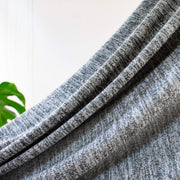 LA Designer Heathered Gray/Charcoal Lightweight Sweater Knit. image of fabric drape.