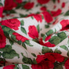 Create a stunning dress or a daring head to toe floral pant suit with this stunning Caroline Rose Tana Lawn fabric, a popular Liberty of London print. This particular print "...is an archival classic, originally painted in the 1990s to emulate the round beautiful forms of vintage 1950s florals." Close up photo.