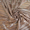 Enjoy the confidence that comes with sewing up something gorgeous in this pleated dress fabric. Bonus...it's double sided! Designed by women, for women, Monte, an LA designer.  Fluid drape with an edgy silver metallic on one side and a darker earthy rose on the other side.  Take advantage of the that selvedge on the silver side, it has a good 4 inch rose border! I can't help but picture the coolest halter maxi or midi dress, how about you?