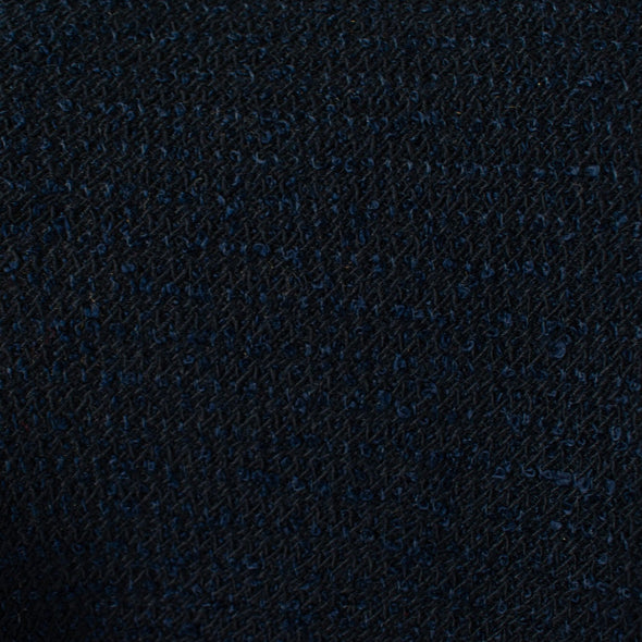NY Designer boucle suiting with lovely strands of shimmering blue threads is a Classic French Jacket waiting to happen! This is a nice choice when you want something different than black but still want the drama and sophistication of a darker color. Close up image of boucle texture.