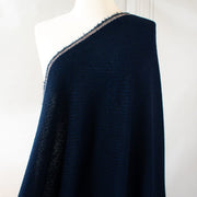 NY Designer boucle suiting with lovely strands of shimmering blue threads is a Classic French Jacket waiting to happen! This is a nice choice when you want something different than black but still want the drama and sophistication of a darker color.  Close up image of fabric draped on dressform.