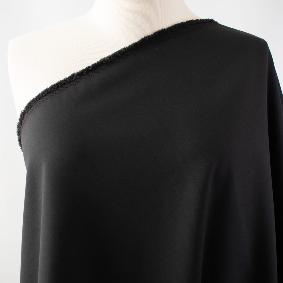 Famous Designer Black Cotton/Poly/Lycra Stretch Suiting 'Raven' – Fancy ...