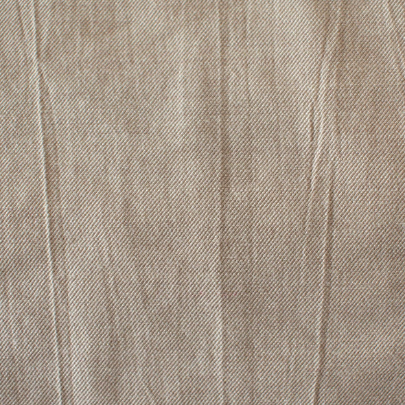 Washed linen blend has a soft, textured, slightly crisp hand, and some drape from the rayon. Make up a gorgeous top, dress or skirt that stands out!  Translucent with a washed look and pleasing slubbed texture, may need lining for dresses and skirts. Close up image of fabric.