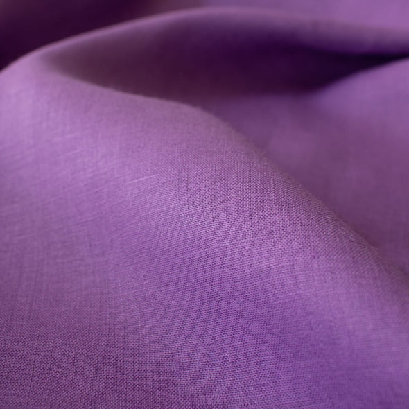 Perk up your summer wardrobe with some color!  This soft English Violet shirt-weight linen would make a perfect layering piece.  Nothing says summer style more than an open shirtdress over a column of white basics. So chic!  This is also perfect for summer dresses and tops!  Close up image.