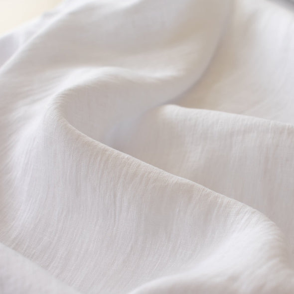 This special European washed linen from Italy is airy, light, and simply gorgeous. A linen that is so soft...perfect for warmer weather. Stay on trend and sew up a lovely relaxed tunic or maxi! Image of fabric texture.