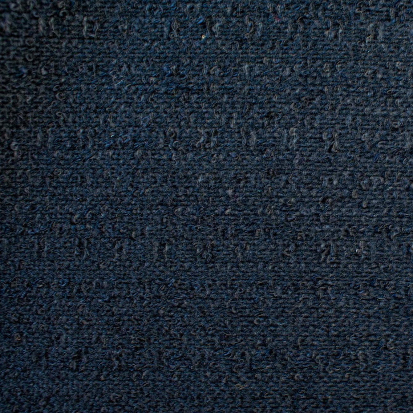 Couture Designer Flat Boucle Wool Blend fabric in black. Perfect for a French Jacket! - close up of fabric weave